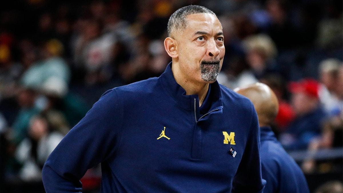 Michigan head coach Juwan Howard reacts to a play against Penn State during the second half of the First Round of Big Ten tournament at Target Center