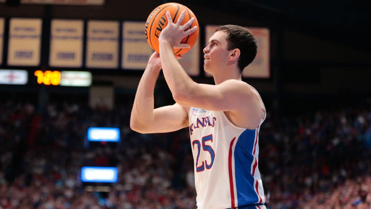 Kansas graduate senior Nicolas Timberlake (25) aims up a three-pointer during the first half of Monday's game against North Carolina Central inside Allen Fieldhouse.
