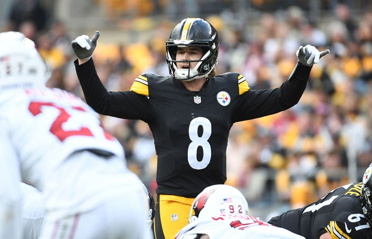 Pittsburgh Steelers quarterback Kenny Pickett (8) makes a play against the Arizona Cardinals during the second quarter at Acrisure Stadium