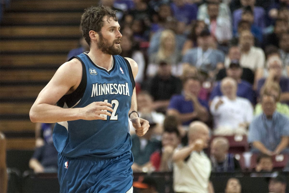 Minnesota Timberwolves forward Kevin Love (42) runs up the court after scoring against the Sacramento Kings during the first quarter at Sleep Train Arena. The Sacramento Kings defeated the Minnesota Timberwolves 106-103.