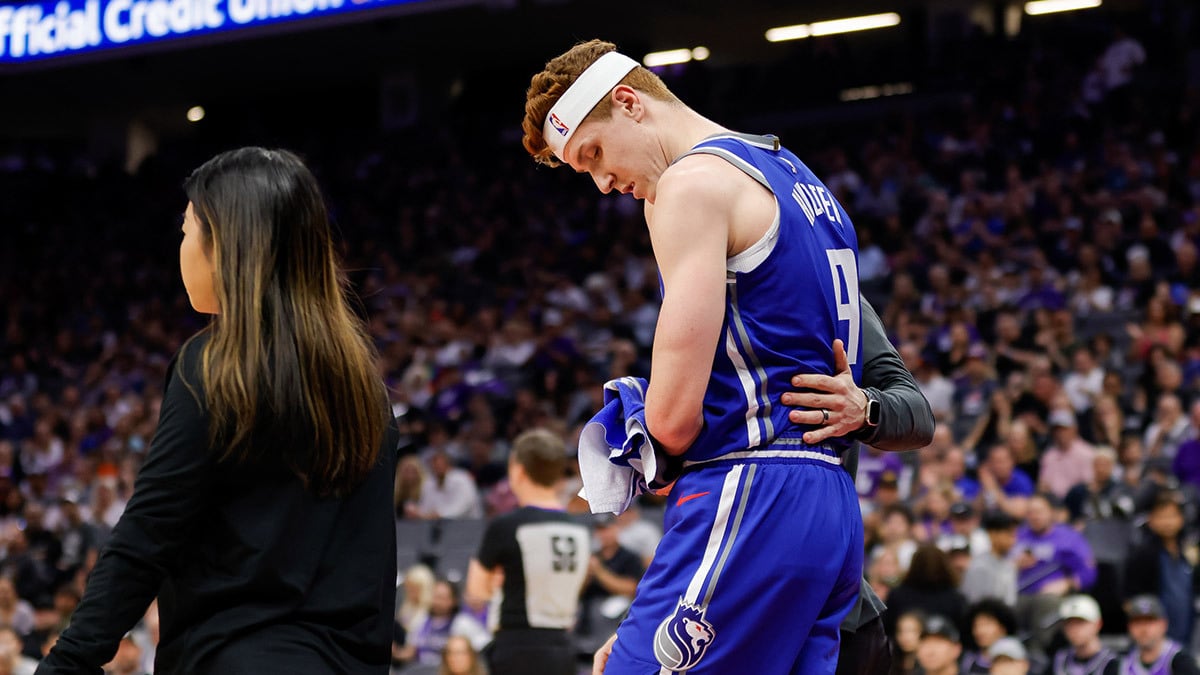 Sacramento Kings guard Kevin Huerter (9) suffers an injury during the first quarter against the Memphis Grizzlies at Golden 1 Center.