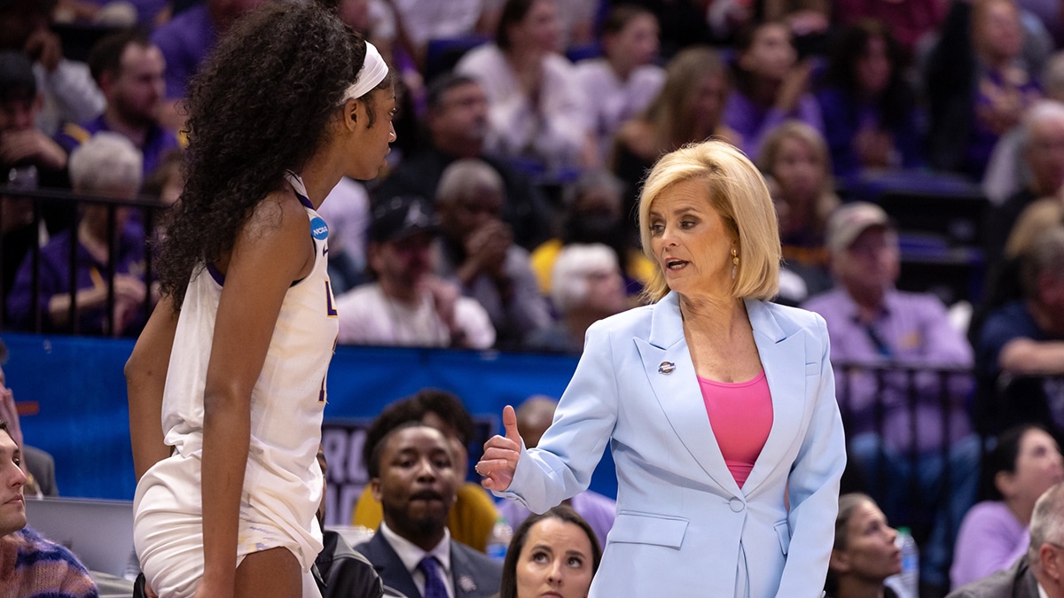 LSU Lady Tigers head coach Kim Mulkey sends forward Angel Reese (10) back into the game against the Rice Owls during the second half at Pete Maravich Assembly Center.