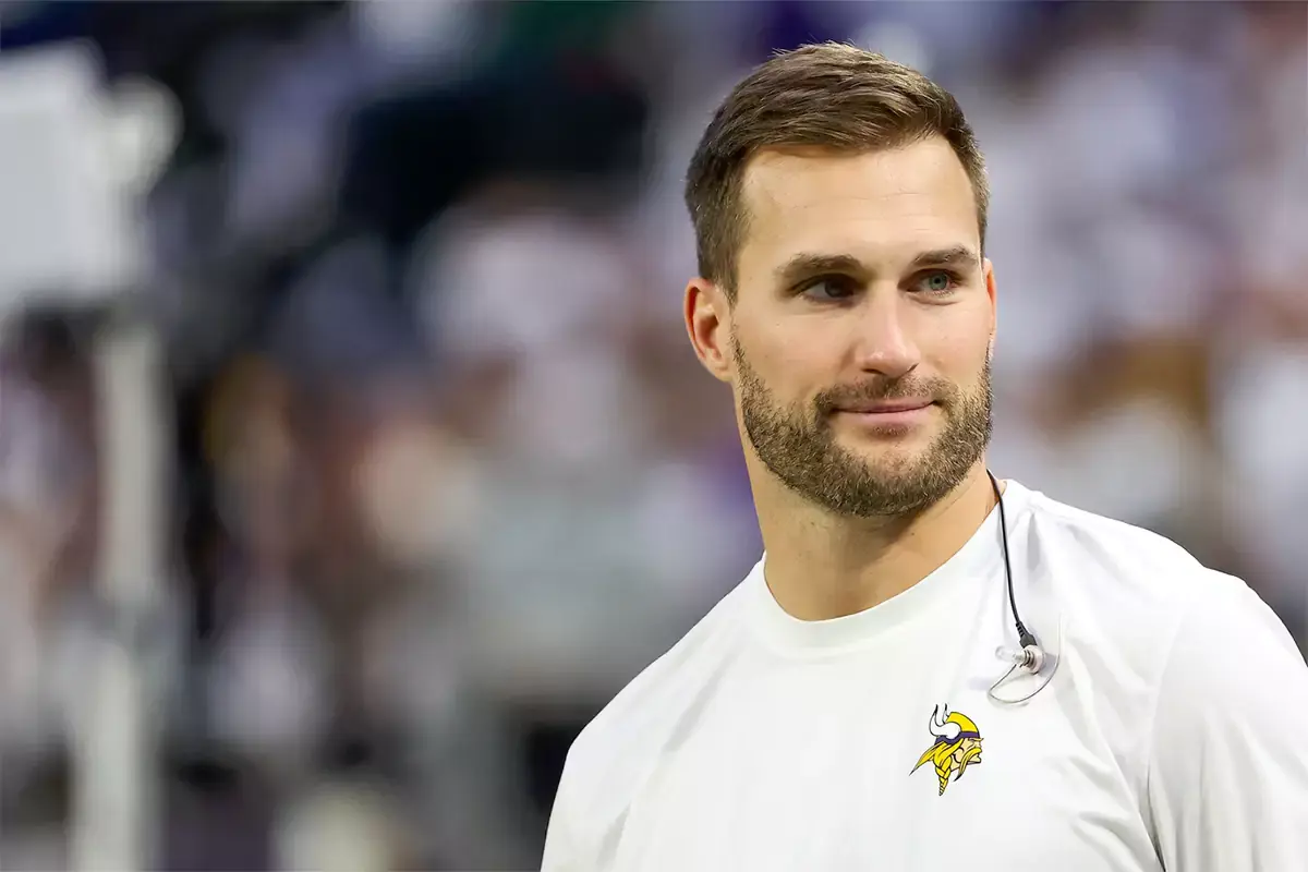  Minnesota Vikings quarterback Kirk Cousins (8) looks on from the bench during the second quarter against the Detroit Lions at U.S. Bank Stadium.