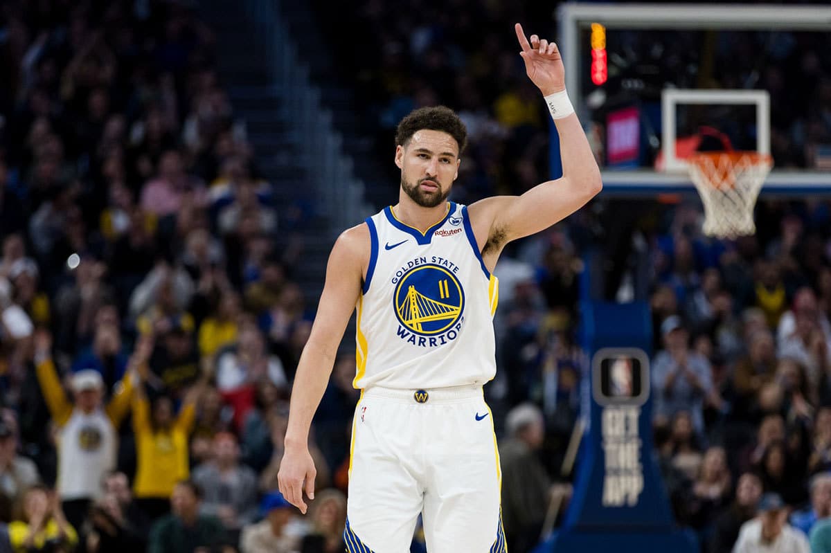 Golden State Warriors guard Klay Thompson (11) gestures after hitting a three-point shot against the New York Knicks during the second half at Chase Center. 