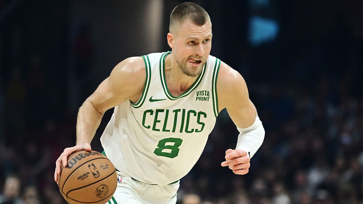 Boston Celtics center Kristaps Porzingis (8) brings the ball up court during the first half against the Cleveland Cavaliers at Rocket Mortgage FieldHouse. 