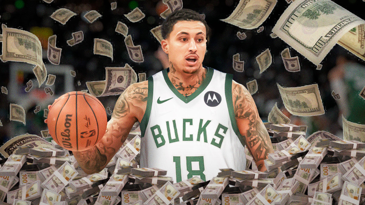 Kyle Kuzma surrounded by piles of cash.
