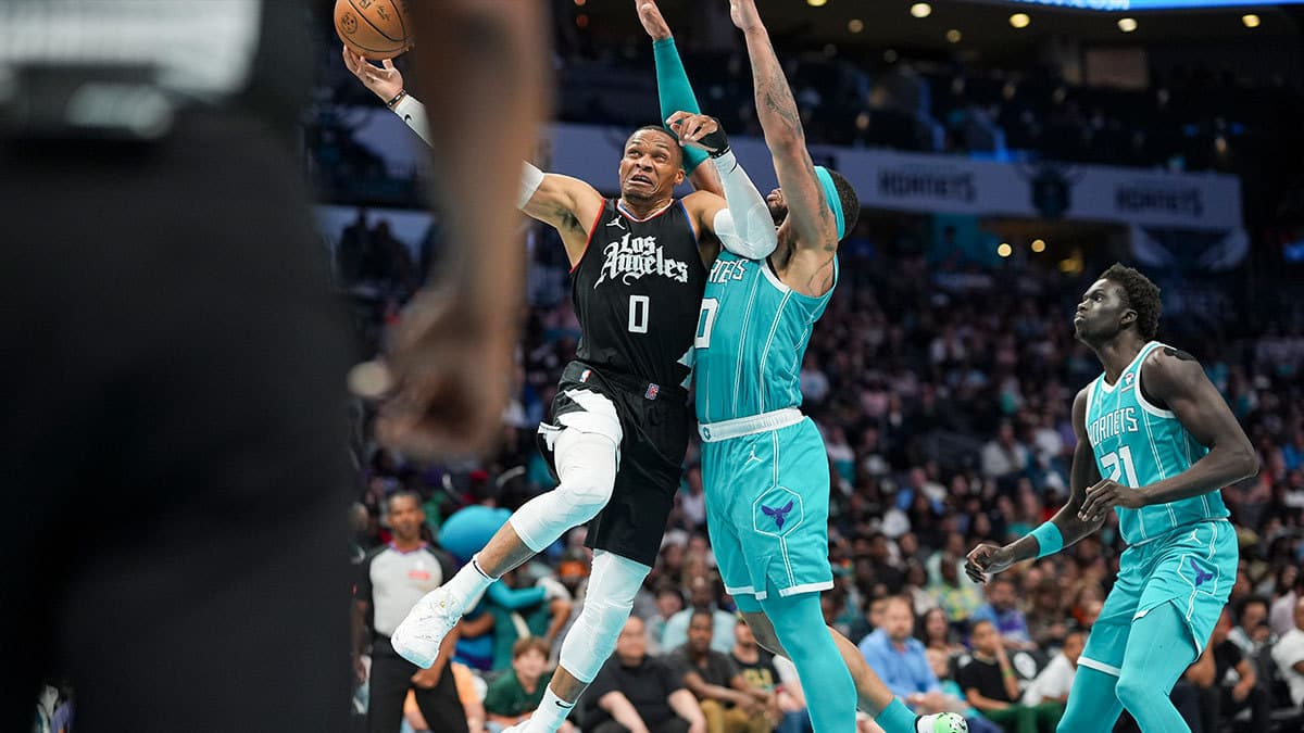 LA Clippers guard Russell Westbrook (0) goes up for a basket against Charlotte Hornets forward Miles Bridges (0) 