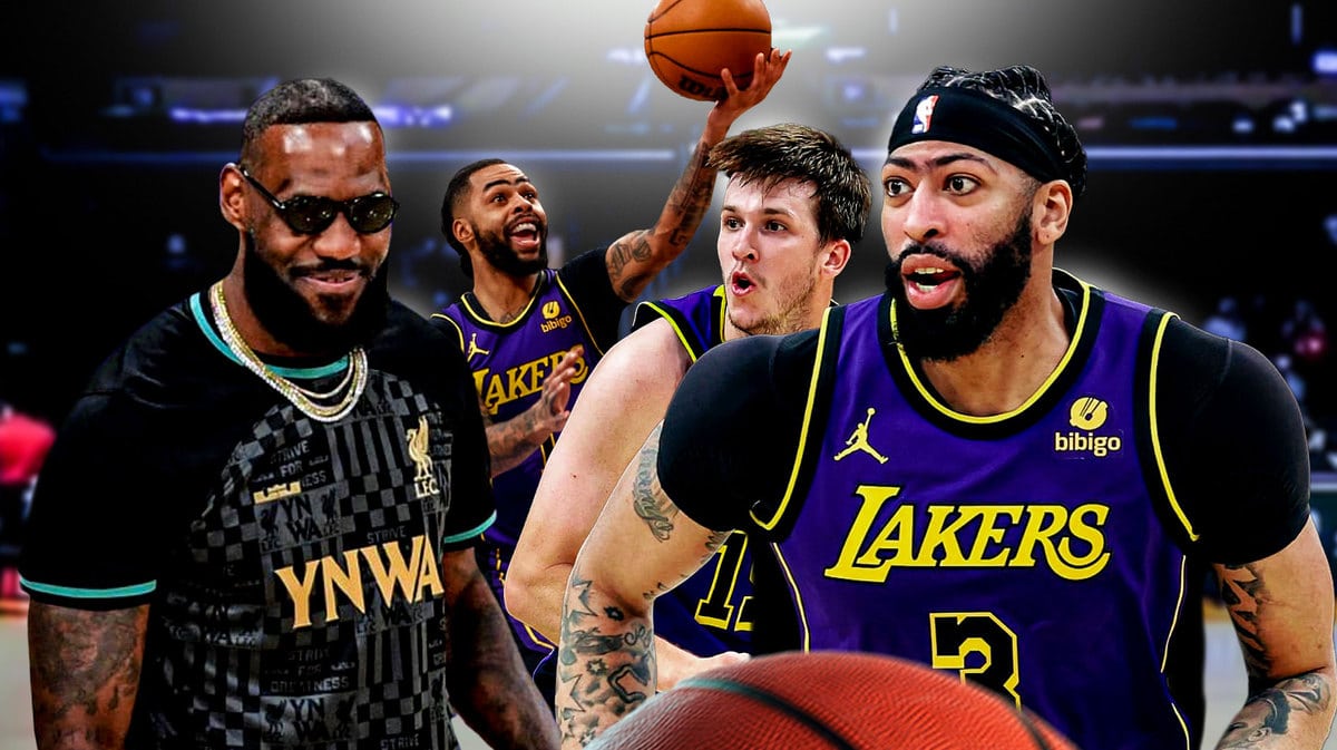Lakers' Anthony Davis, Austin Reaves and D’Angelo Russell hyped up, with LeBron James smiling at them in casual clothes