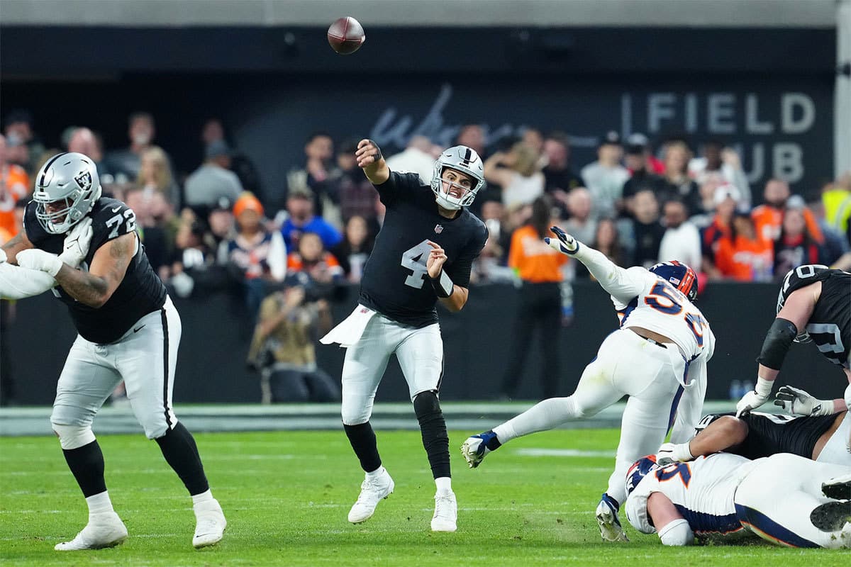 Las Vegas Raiders quarterback Aidan O'Connell (4) throws against the Denver Broncos during the fourth quarter at Allegiant Stadium. 