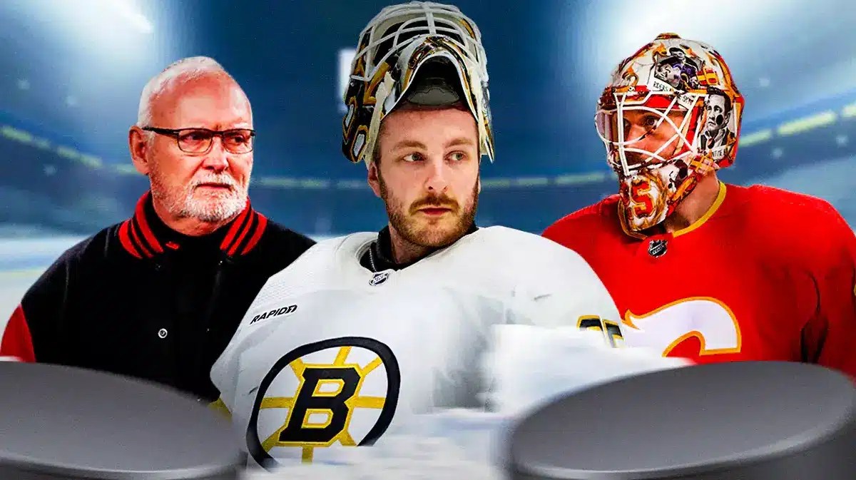 Devils coach looking at Jacob Markstrom and Linus Ullmark.
