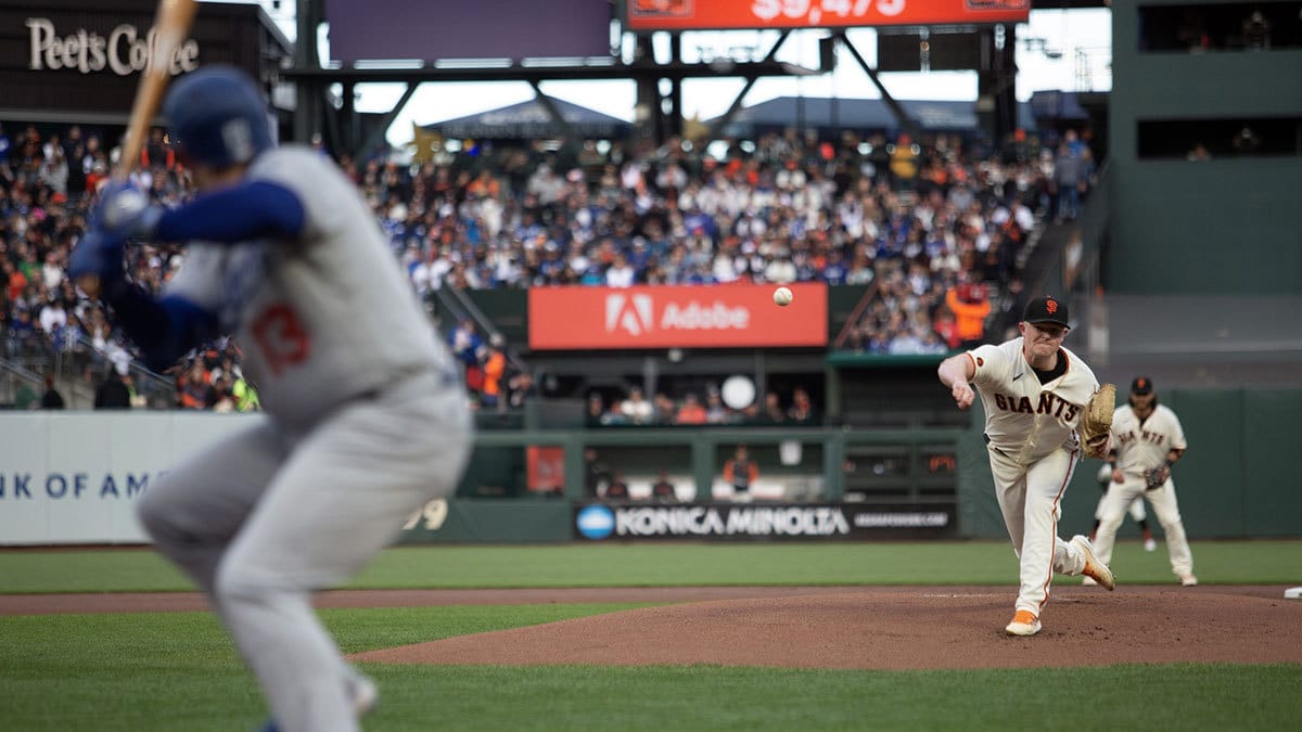 San Francisco Giants starting pitcher Logan Webb (62) delivers a pitch against the Los Angeles Dodgers during the first inning at Oracle Park.