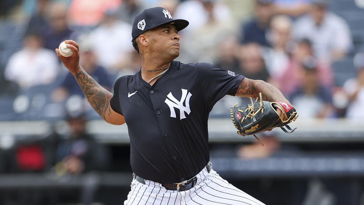 New York Yankees pitcher Luis Gil (81) throws a pitch against the New York Mets in the first inning at George M. Steinbrenner Field
