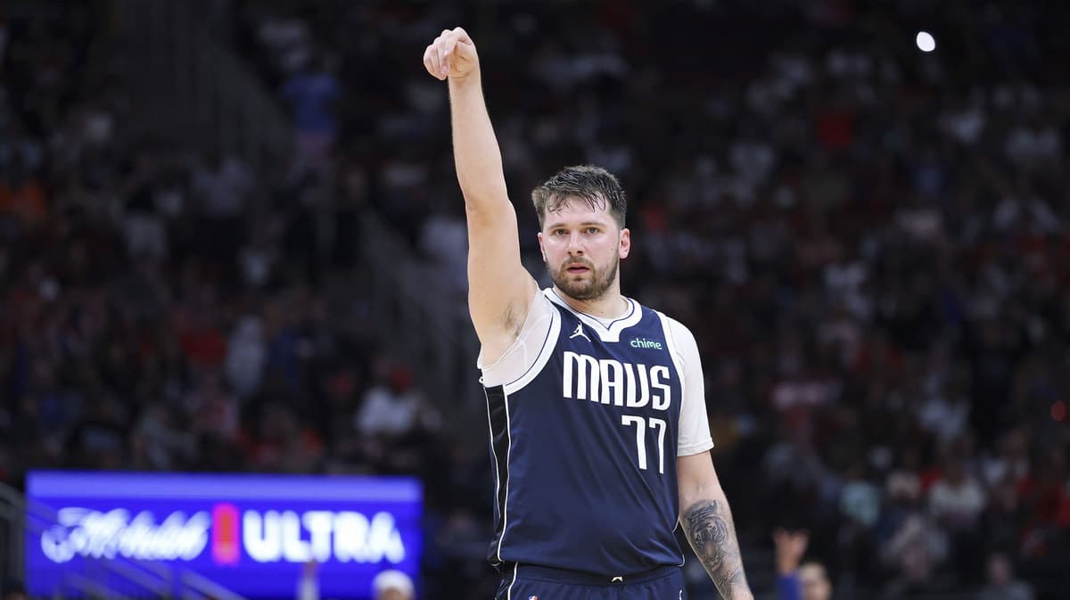 Dallas Mavericks guard Luka Doncic (77) reacts after scoring a basket during the third quarter against the Houston Rockets at Toyota Center. 