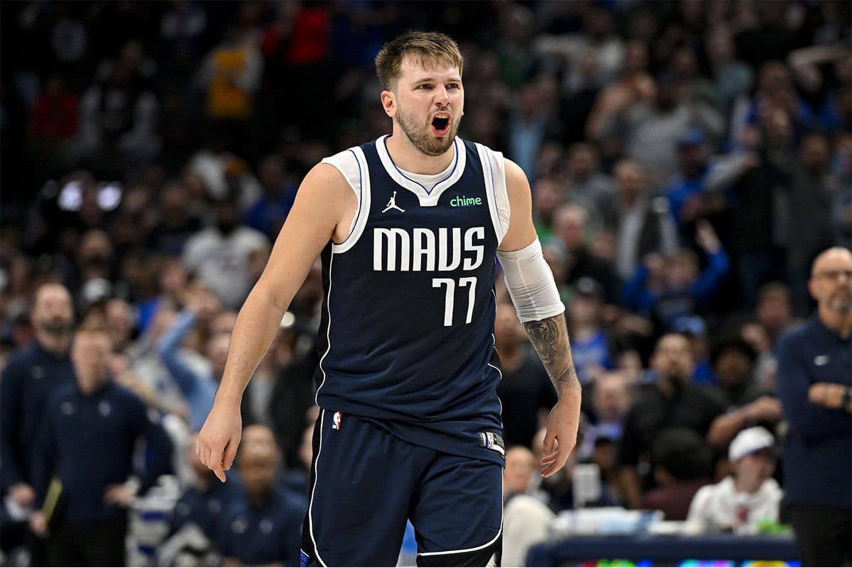 Dallas Mavericks guard Luka Doncic (77) reacts to a call during the second half against the Miami Heat at the American Airlines Center