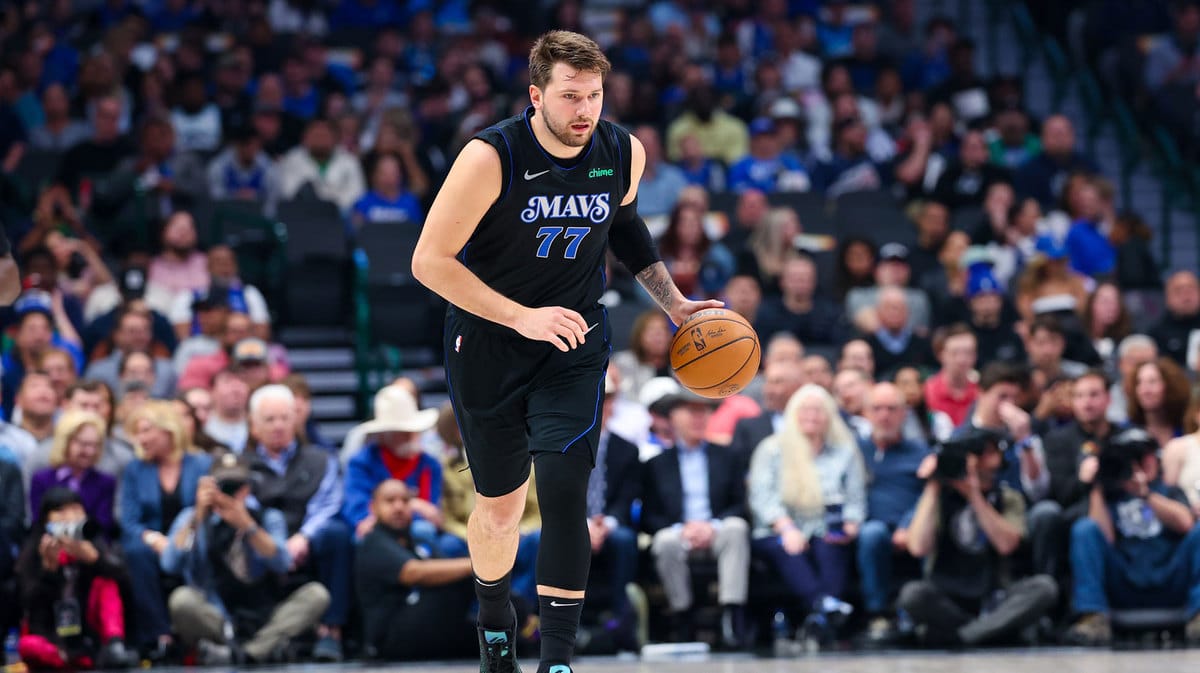 Dallas Mavericks guard Luka Doncic (77) controls the ball during the first half against the Utah Jazz at American Airlines Center.