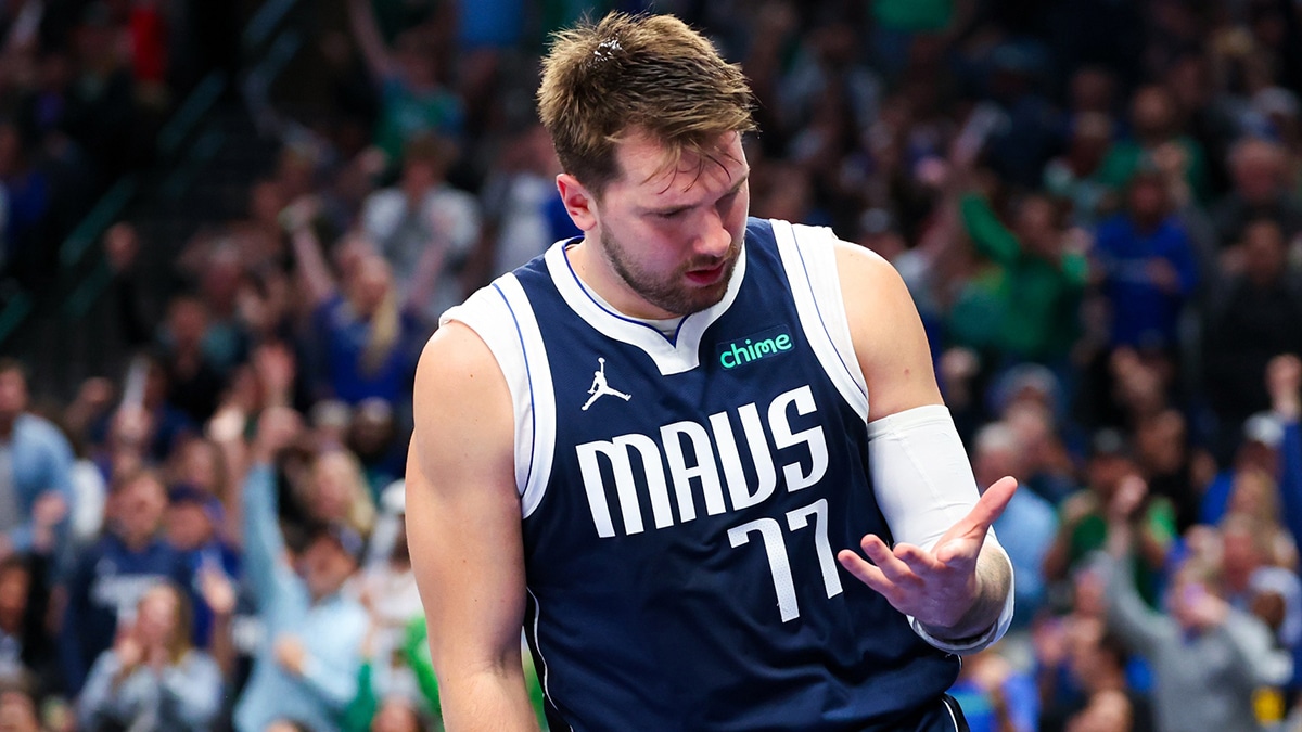 Dallas Mavericks guard Luka Doncic (77) reacts after scoring during the second half against the Denver Nuggets at American Airlines Center.