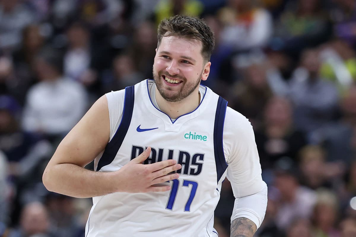 Dallas Mavericks guard Luka Doncic (77) reacts to a play against the Utah Jazz during the fourth quarter at Delta Center.