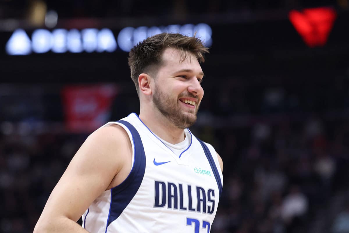 Dallas Mavericks guard Luka Doncic (77) reacts to a play against the Utah Jazz during the first quarter at Delta Center. 
