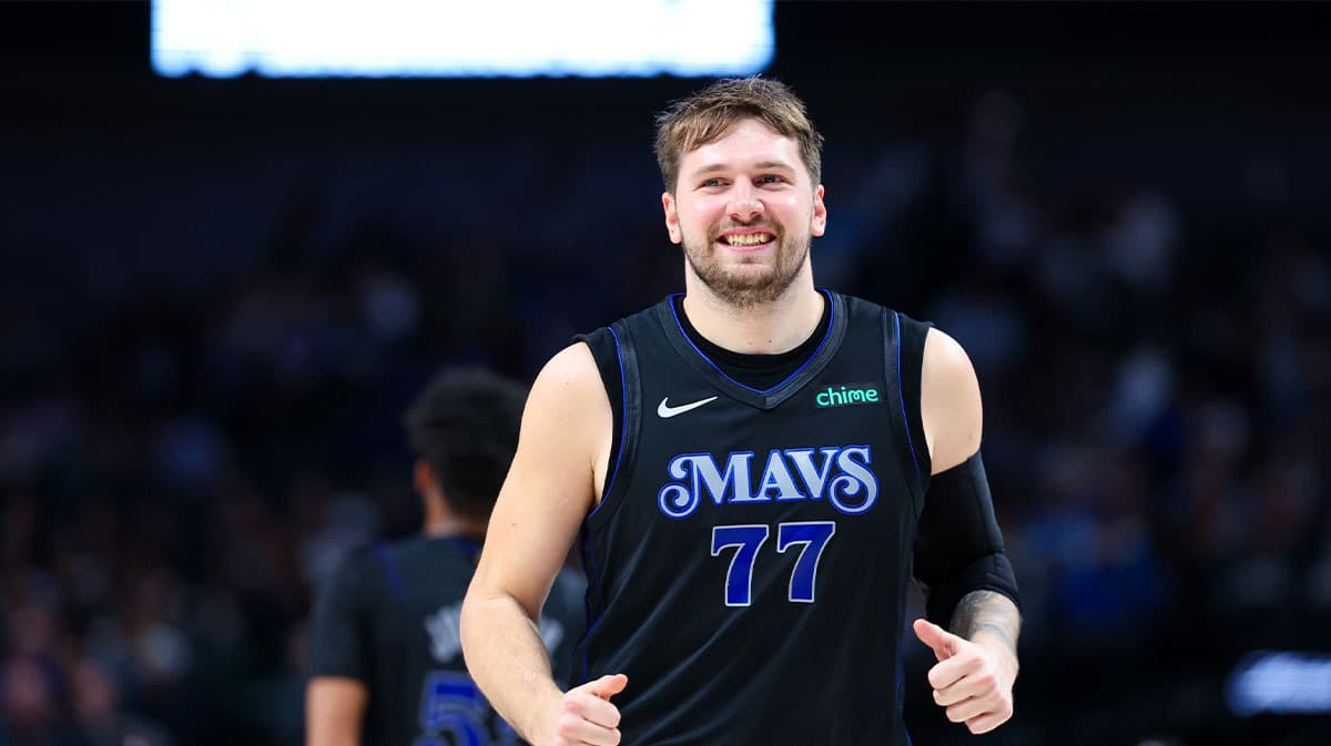  Dallas Mavericks guard Luka Doncic (77) laughs during the second half against the Utah Jazz at American Airlines Center.
