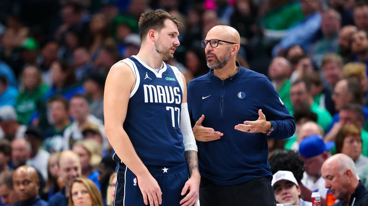 Dallas Mavericks head coach Jason Kidd speaks to Dallas Mavericks guard Luka Doncic (77) during the second half against the Denver Nuggets at American Airlines Center