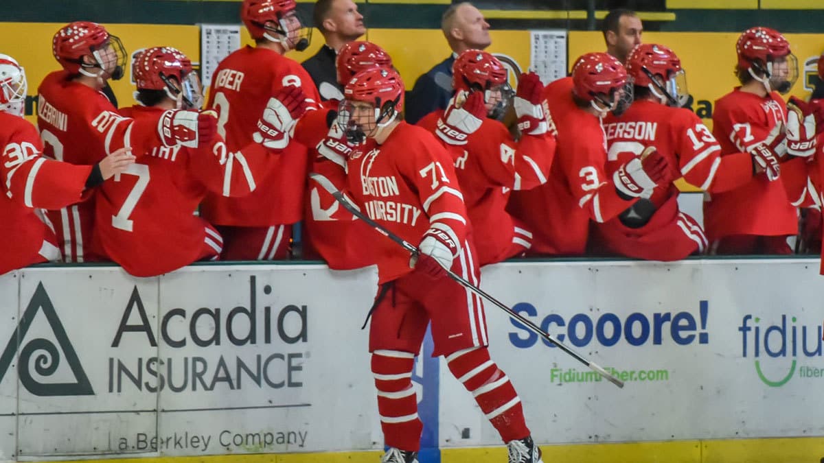The Boston University Terriers celebrate a Macklin Celebrini goal during their 5-1 win over the UVM Catamounts on Friday evening at Gutterson Fieldhouse.