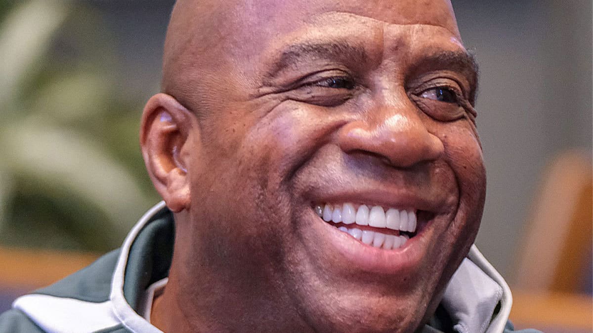 Earvin \"Magic\" Johnson speaks to the media, flashing the well-known smile throughout day. Johnson was in Lansing to help with his Earvin \"Magic\" Johnson's Holiday Hope for Families event that served 800 needy families Saturday, Nov. 11, 2023.