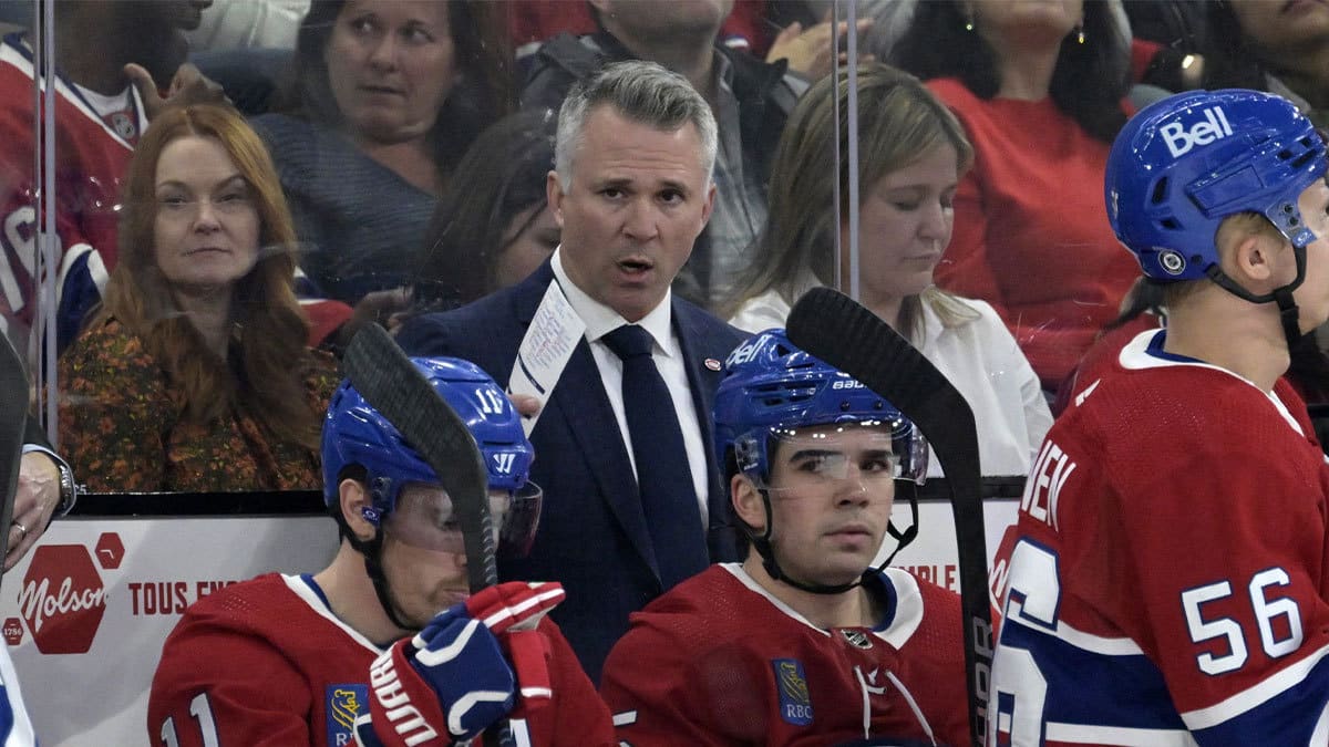 Montreal Canadiens head coach Martin St-Louis behind the bench during the first period of the game against the Buffalo Sabres at the Bell Centre.