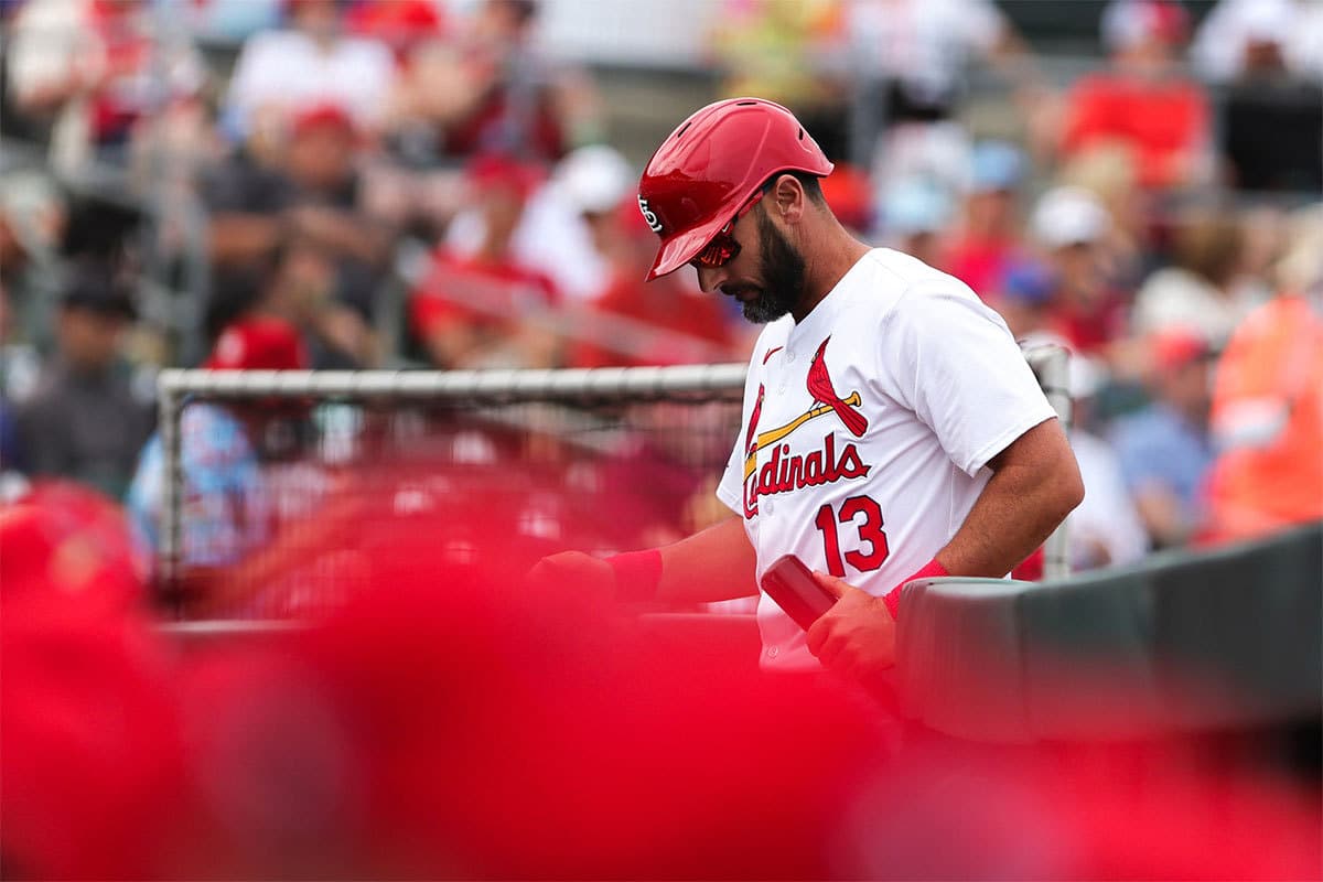 St. Louis Cardinals designated hitter Matt Carpenter (13) returns to the dugout after striking out against the New York Mets during the third inning at Roger Dean Chevrolet Stadium.