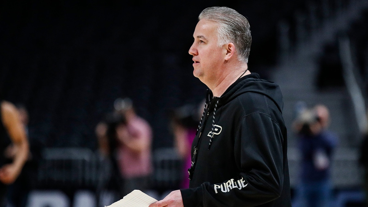 Purdue head coach Matt Painter watches open practice in college basketball transfer portal before the Midwest Regional Sweet 16 round at Little Caesars Arena in Detroit