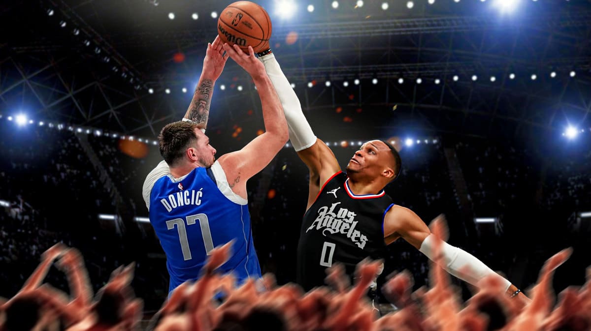 Luka Doncic shooting over Russel Westbrook