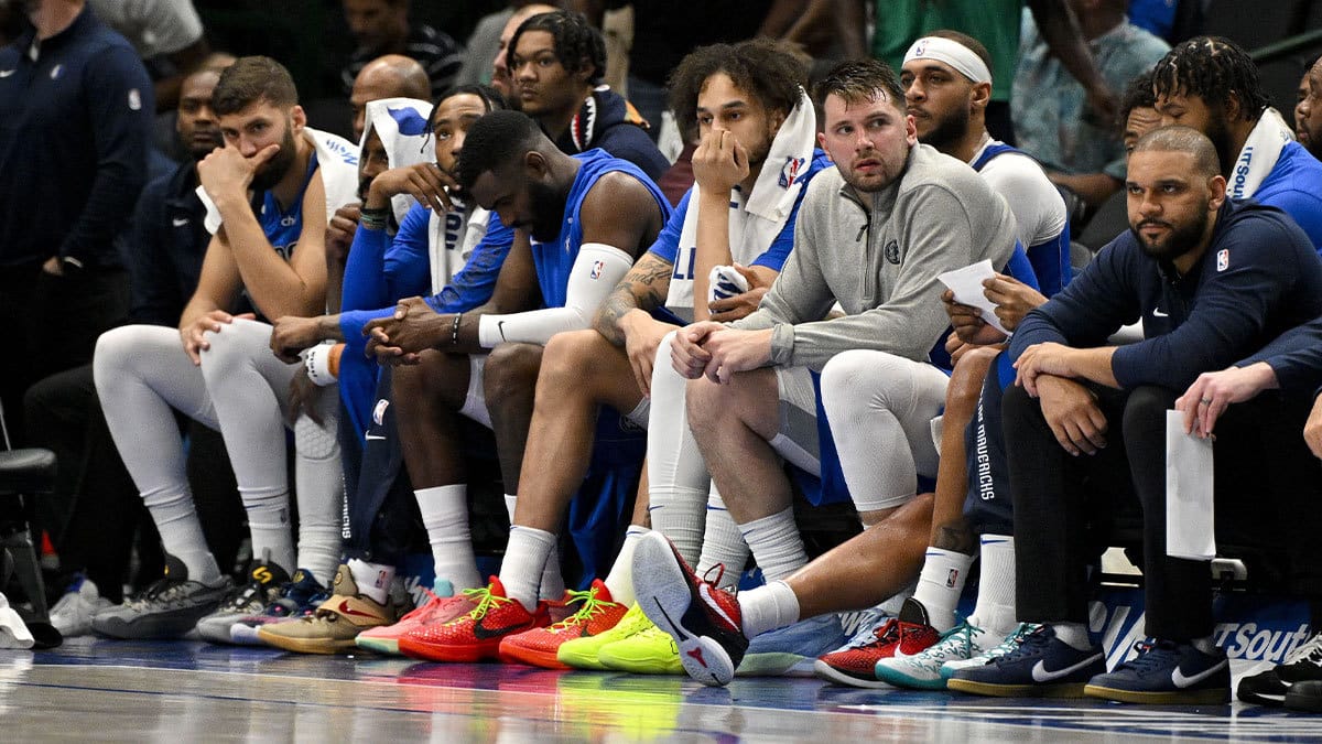 Dallas Mavericks guard Luka Doncic (77) watches from the team bench during the second half against the Indiana Pacers at the American Airlines Center.
