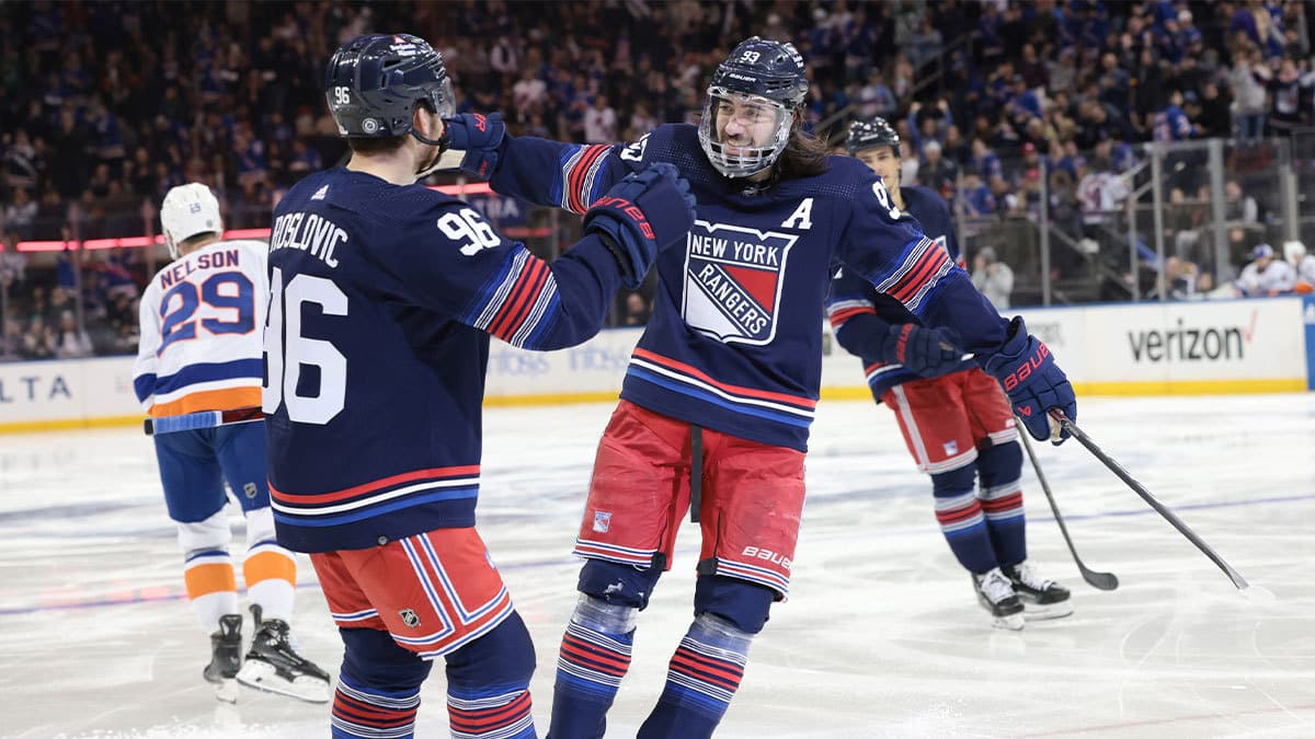 New York Rangers center Mika Zibanejad (93) celebrates his goal with center Jack Roslovic (96) during the second period against the New York Islanders at Madison Square Garden