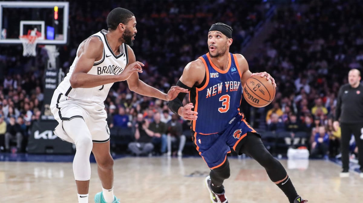 New York Knicks guard Josh Hart (3) looks to drive past Brooklyn Nets forward Mikal Bridges (1) in the third quarter at Madison Square Garden.