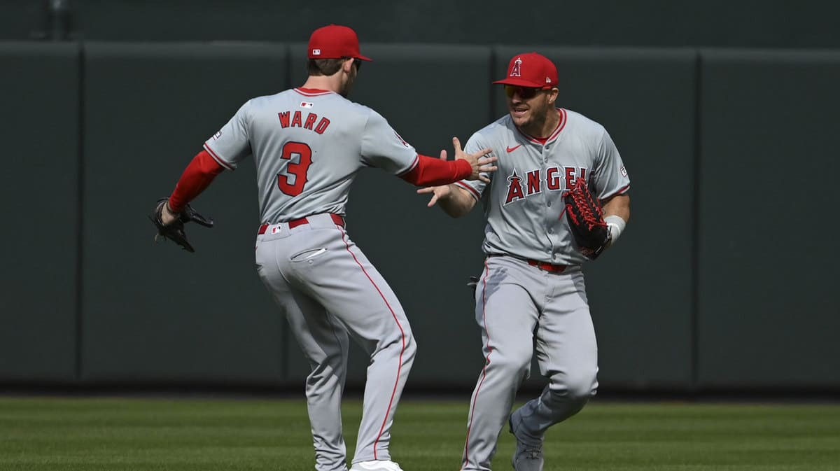 Mike Trout and Taylor Ward celebrating together on the Los Angeles Angels