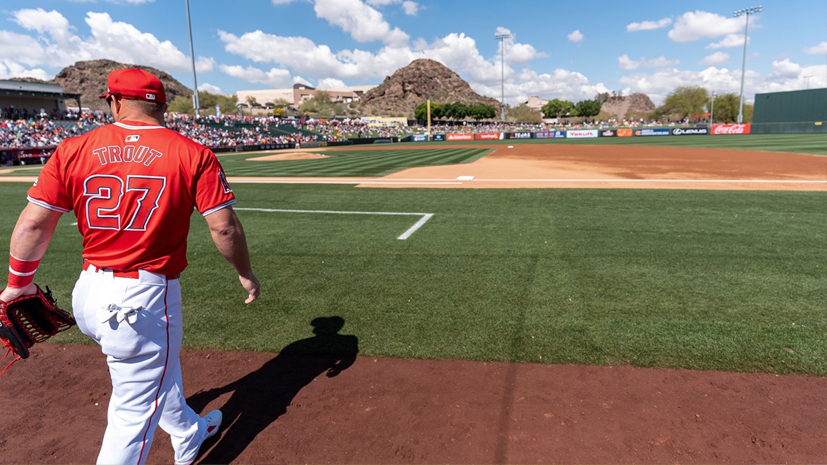 Los Angeles Angels outfielder Mike Trout (27) readies himself in advance of a spring training game against the Colorado Rockies at Tempe Diablo Stadium. 