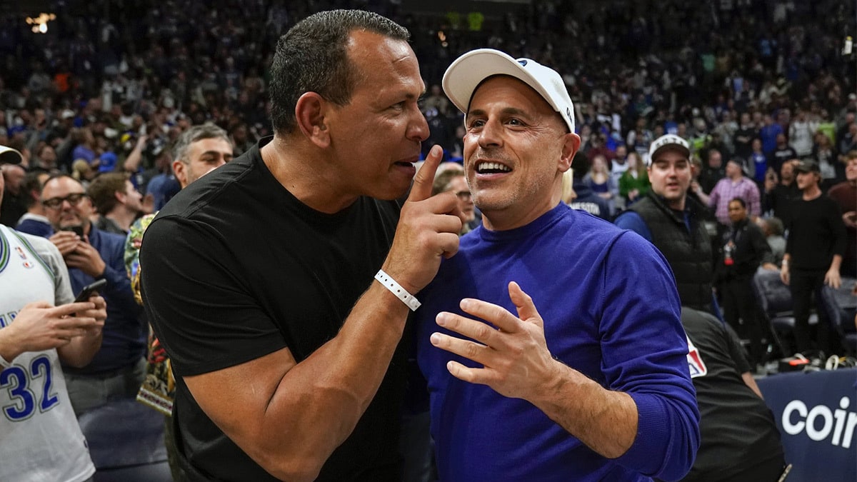 Minnesota Timberwolves co-minority owners Alex Rodriguez and Marc Lore celebrate a victory over the Los Angeles Clippers after a play-in game at Target Center. 