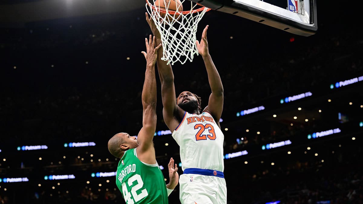 New York Knicks center Mitchell Robinson (23) shoots the ball
