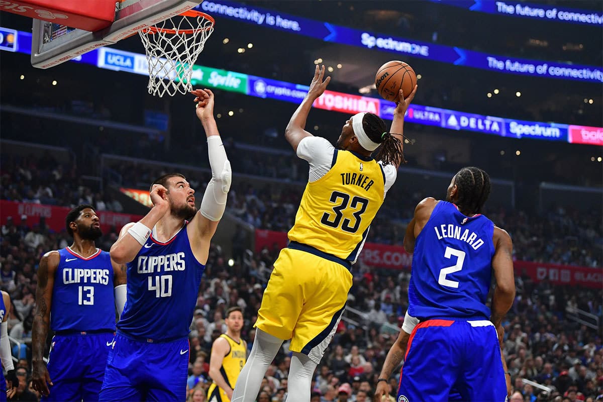 Indiana Pacers center Myles Turner (33) shoots against Los Angeles Clippers center Ivica Zubac (40) and forward Kawhi Leonard (2) during the first half at Crypto.com Arena. 