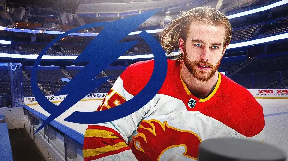 Noah Hanifin (Calgary Flames) next to the Tampa Bay Lightning logo