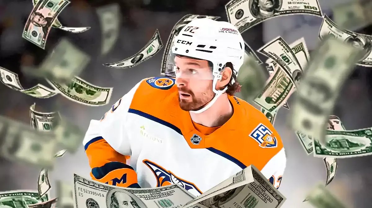 Thomas Novak with a bunch of money falling around him