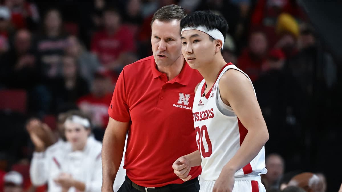 Nebraska Cornhuskers head coach Fred Hoiberg talks with guard Keisei Tominaga (30) during the game against the Purdue Boilermakers in the first half at Pinnacle Bank Arena