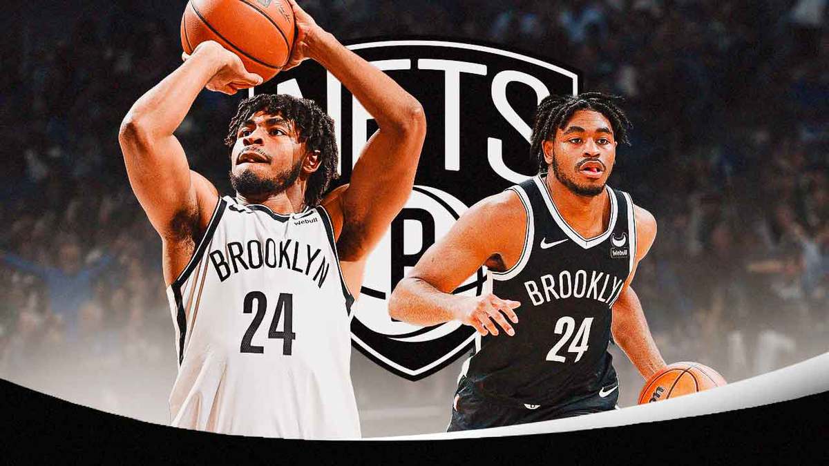 Nets Cam Thomas dribbling and shooting a basketball