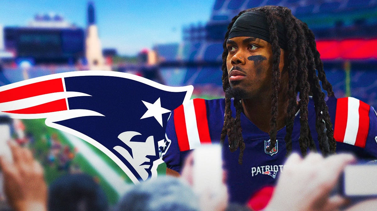 KJ Osborn wearing a Patriots jersey next to a Patriots logo at Foxboro Field