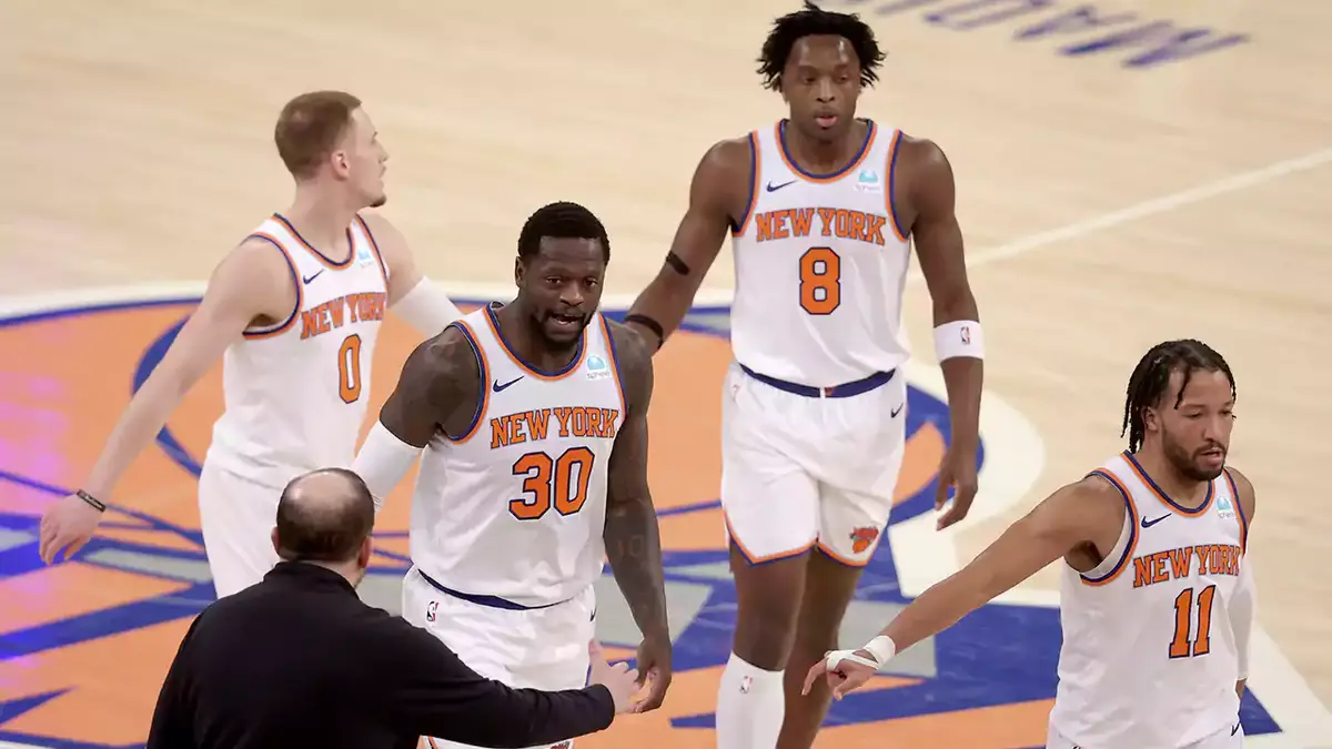 ; New York Knicks head coach Tom Thibodeau high fives New York Knicks forward Julius Randle (30) with guard Donte DiVincenzo (0) and forward OG Anunoby (8) and guard Jalen Brunson (11) during the first quarter against the Washington Wizards at Madison Square Garden