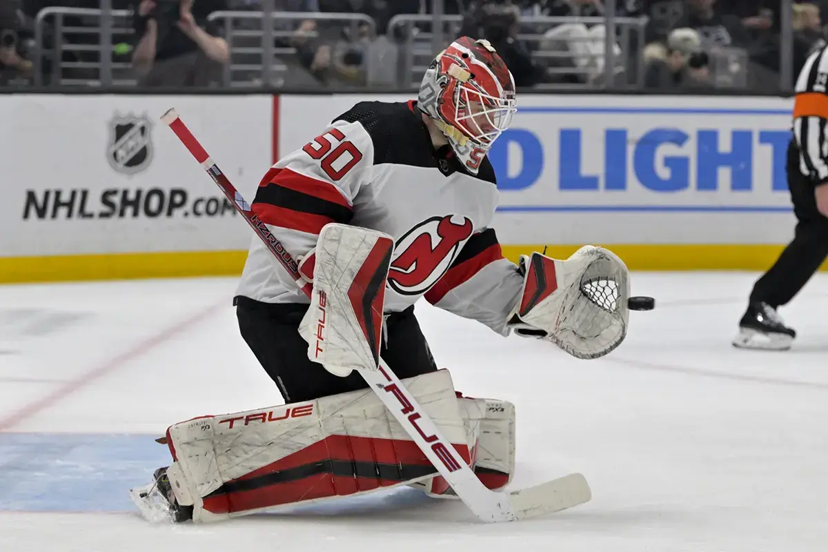 New Jersey Devils goaltender Nico Daws (50) makes a save in the second period against the Los Angeles Kings at Crypto.com Arena.