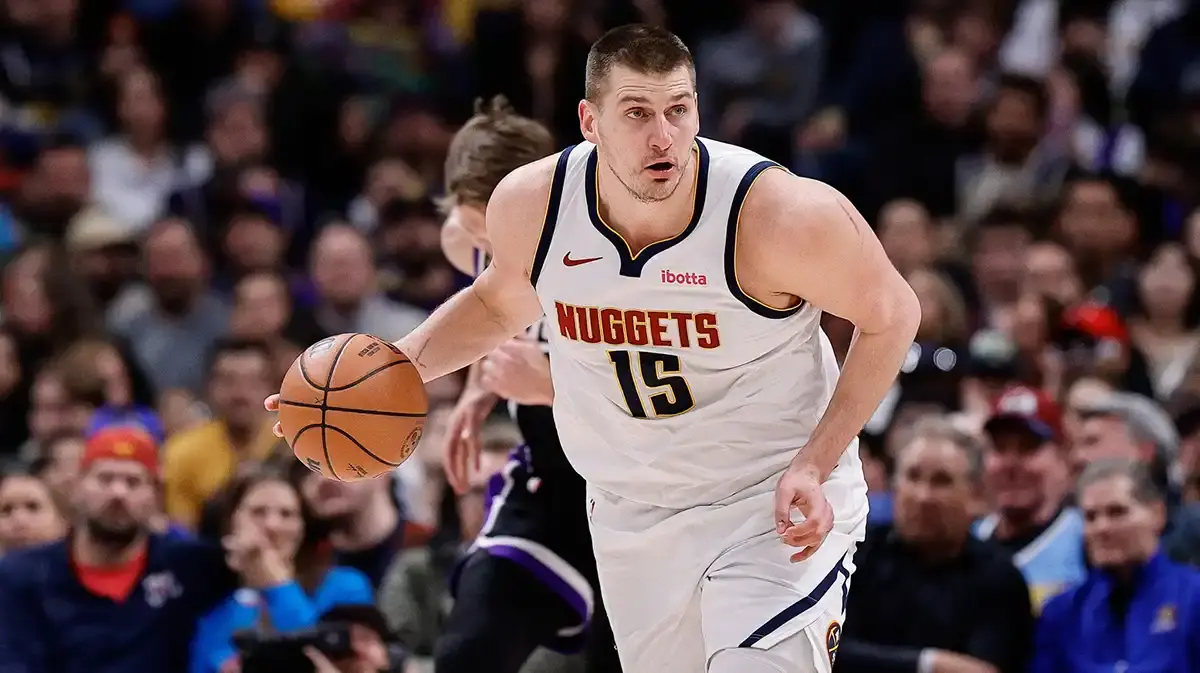  Denver Nuggets center Nikola Jokic (15) controls the ball in the second quarter against the Sacramento Kings at Ball Arena