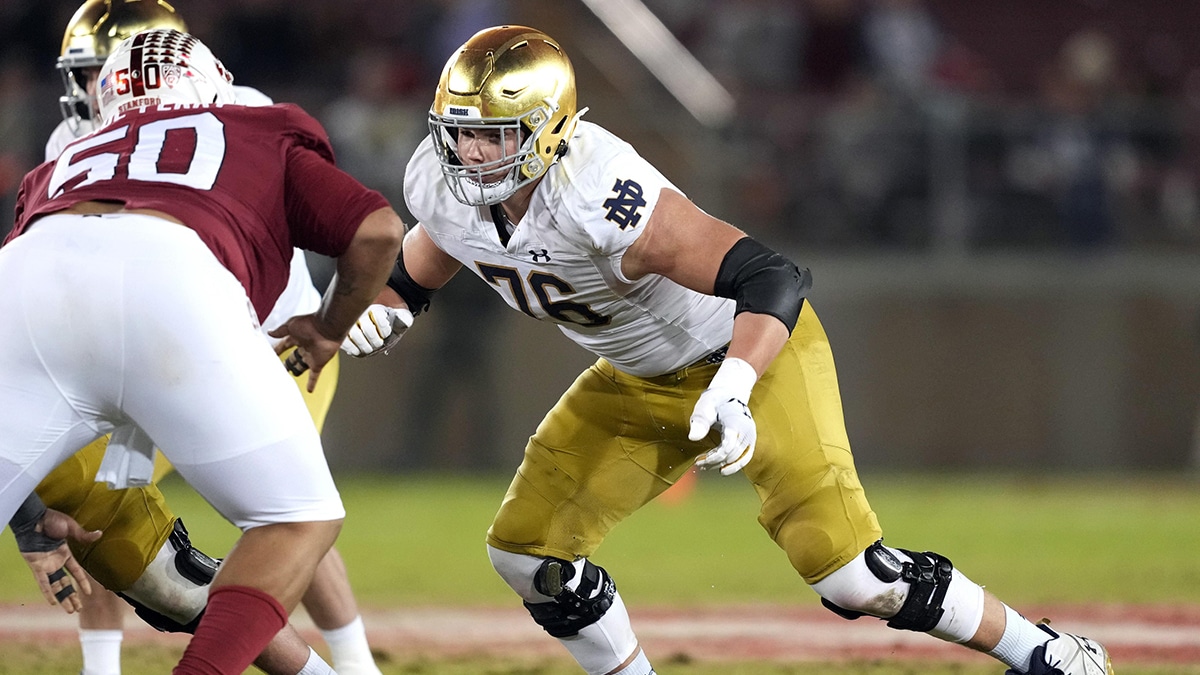 Notre Dame Fighting Irish offensive lineman Joe Alt (76) blocks Stanford Cardinal defensive tackle Dalyn Wade-Perry (50) during the fourth quarter at Stanford Stadium. 