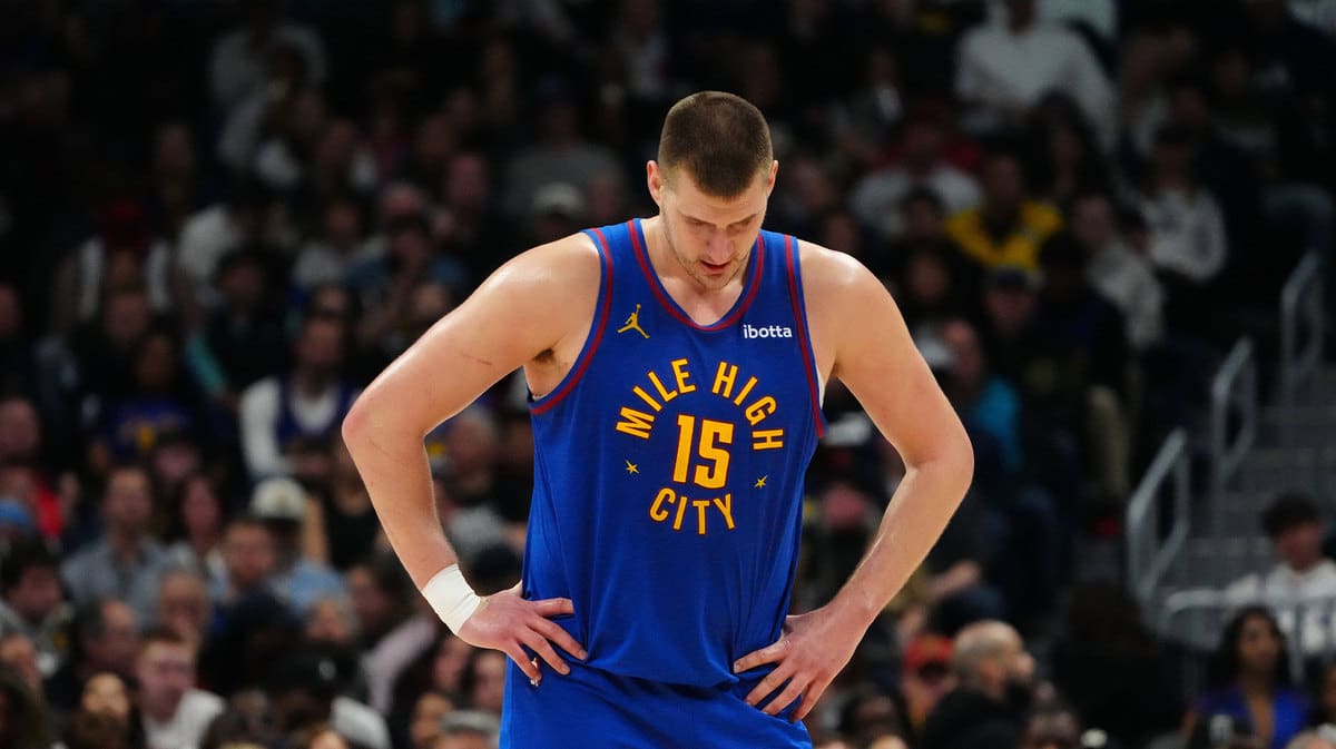 Denver Nuggets center Nikola Jokic (15) reacts in the second half against the Minnesota Timberwolves at Ball Arena.