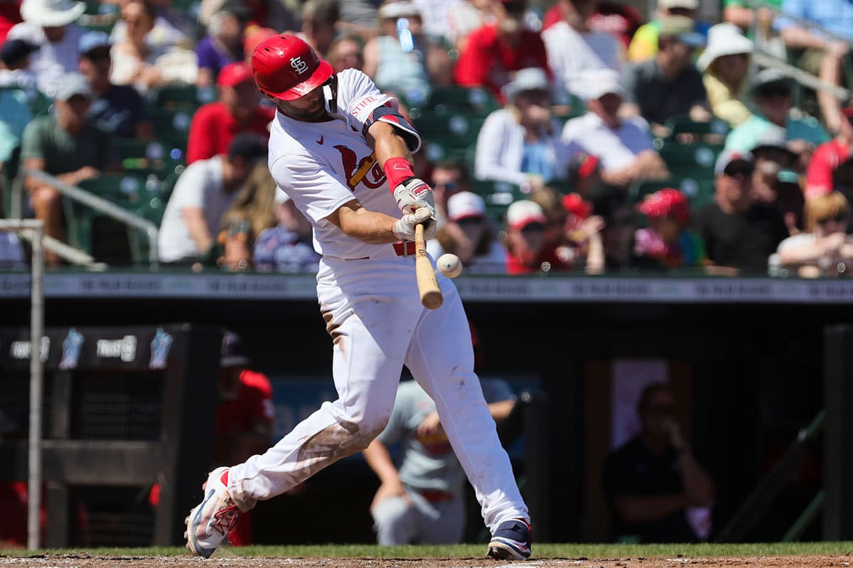 St. Louis Cardinals first baseman Paul Goldschmidt (46) hits an RBI double against the Washington Nationals during the fourth inning at Roger Dean Chevrolet Stadium.