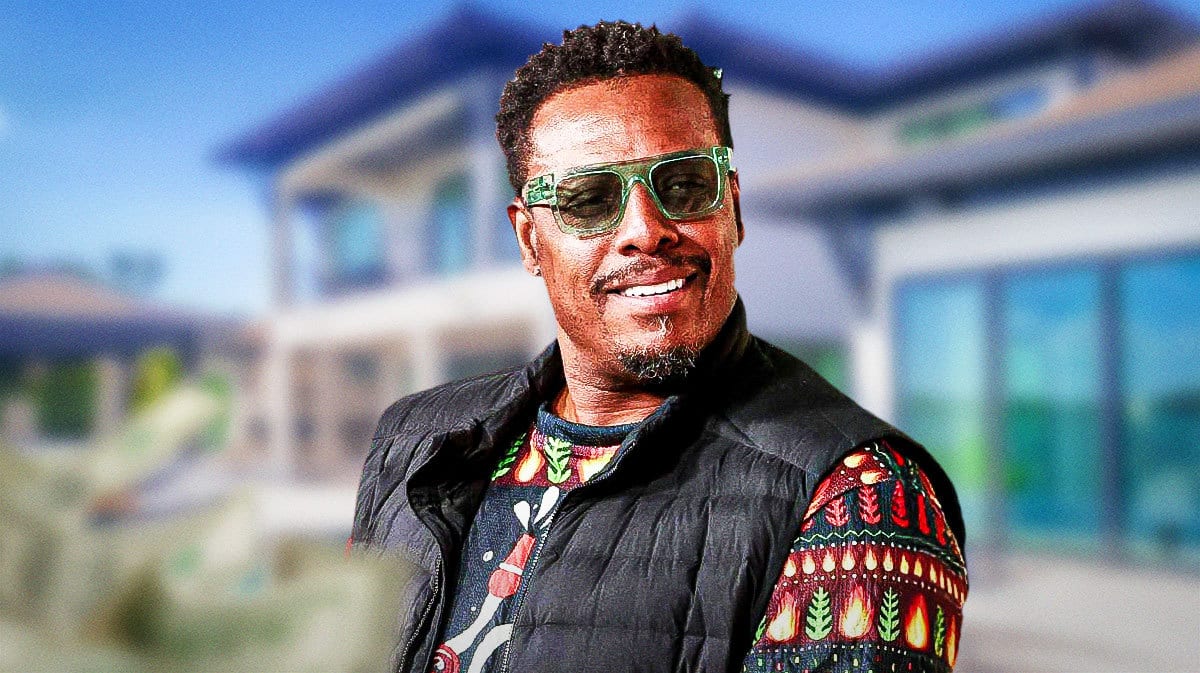 Paul Pierce in front of a house